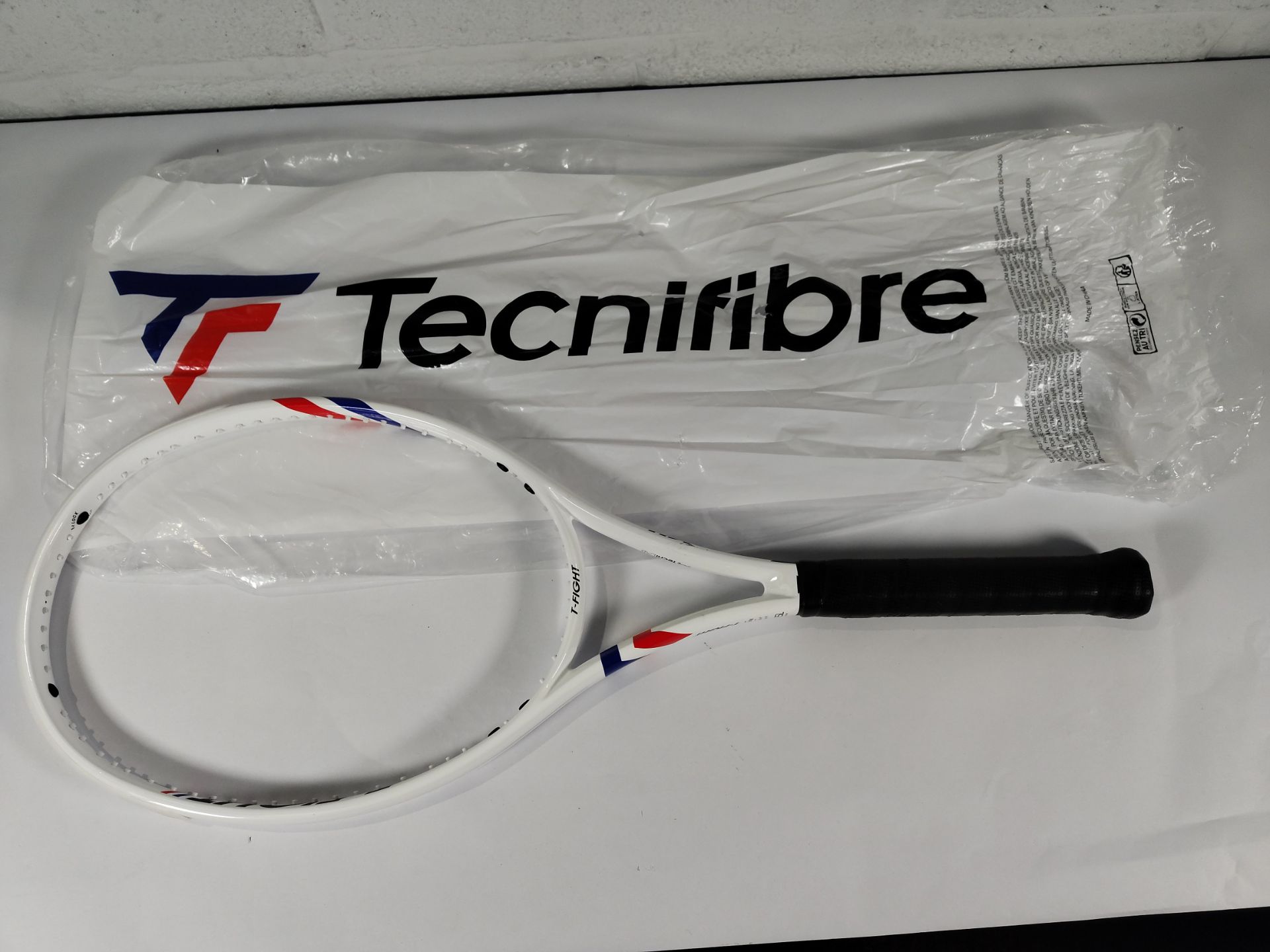 A Technifibre T-Flight 300 unstrung tennis racket (Note: racket has some minor damage and has been p