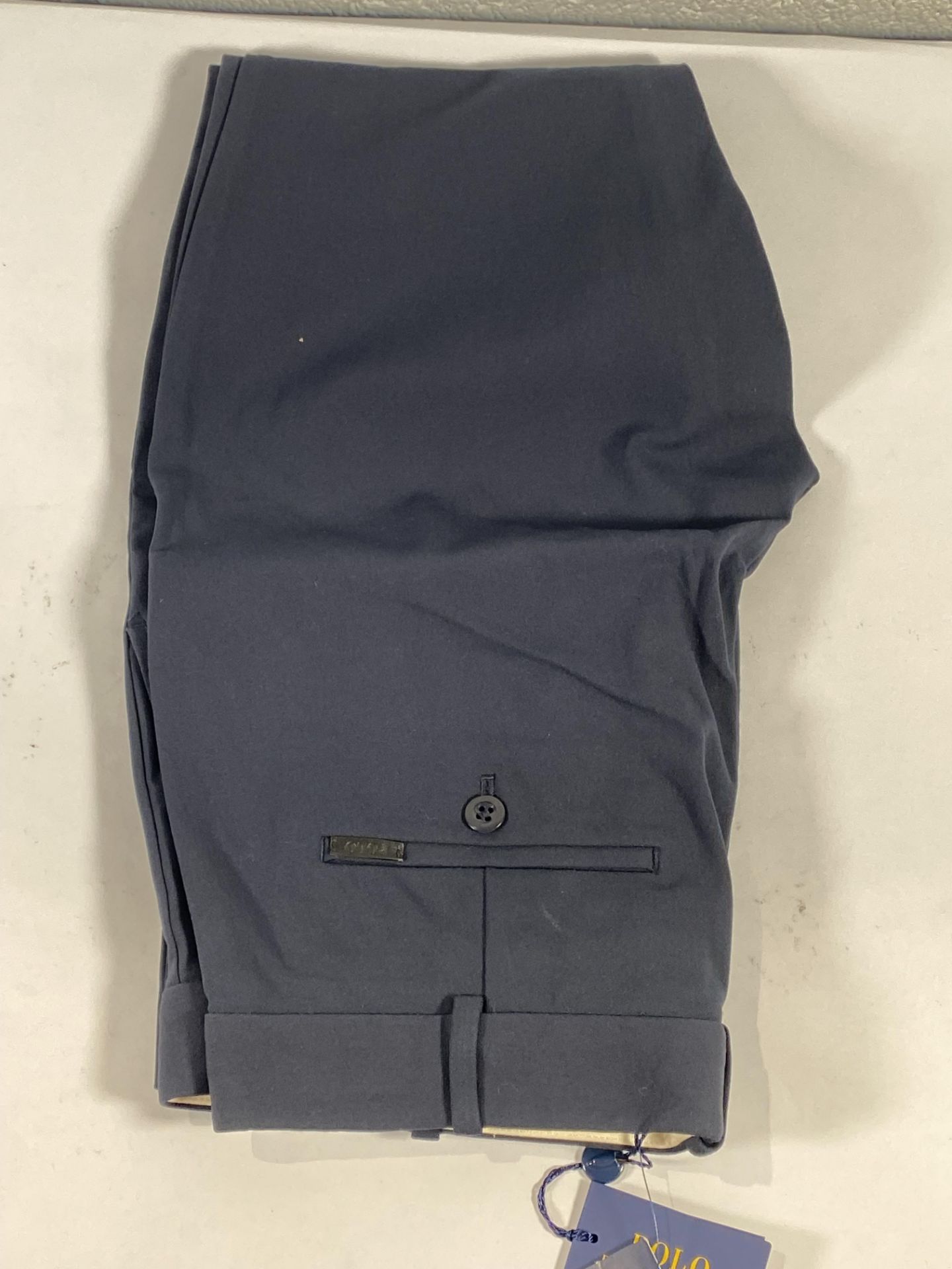 A pair of Ralph Lauren suit trousers (Size 4).