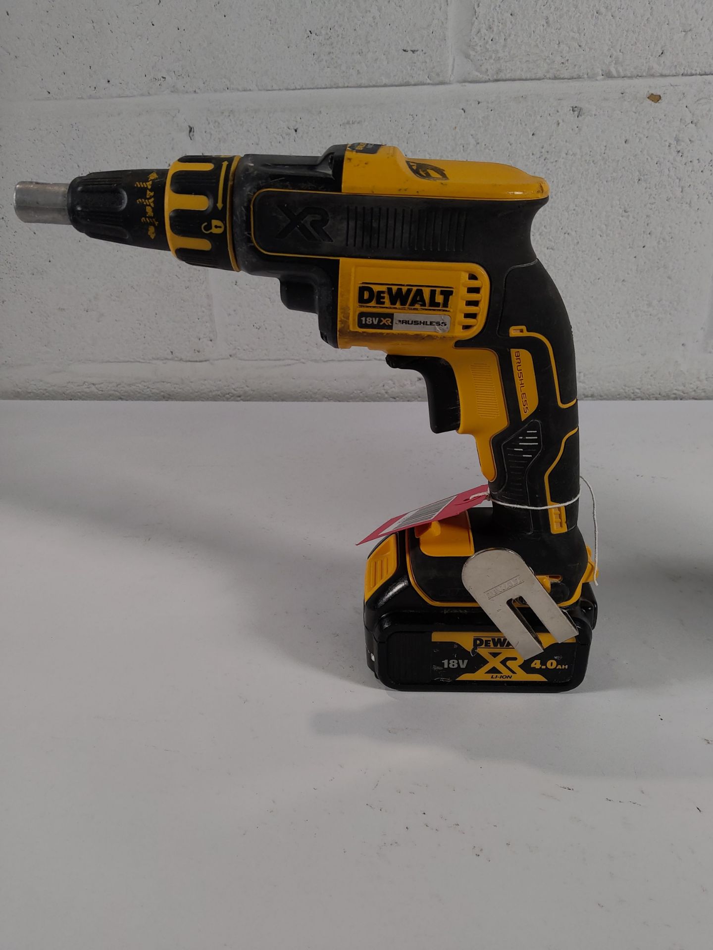 A pre-owned DeWalt DCF620 18v Drywall screwdriver with battery.