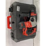 A pre-owned Milwaukee hammer drill with case (unit only).