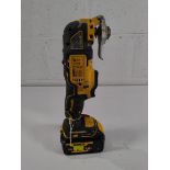 A pre-owned DeWalt DCS355 18v multi tool with battery.