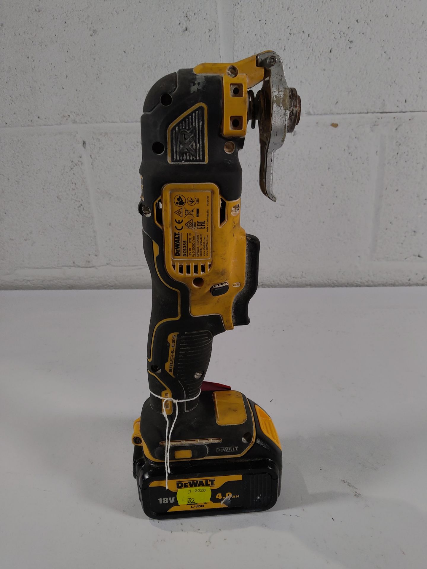 A pre-owned DeWalt DCS355 18v multi tool with battery.