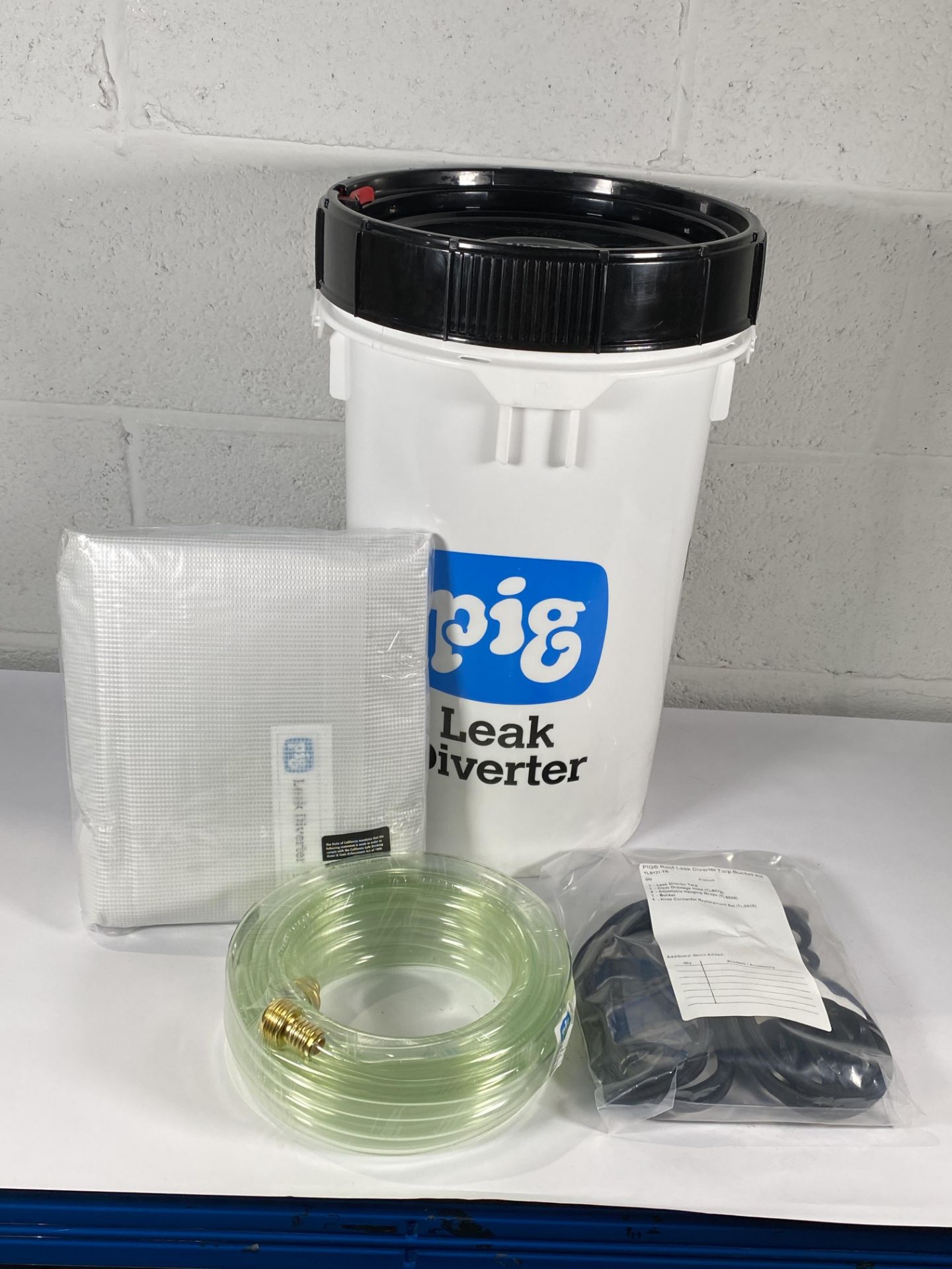 An as new Pig roof leak diverter tarp bucket kit (5L).