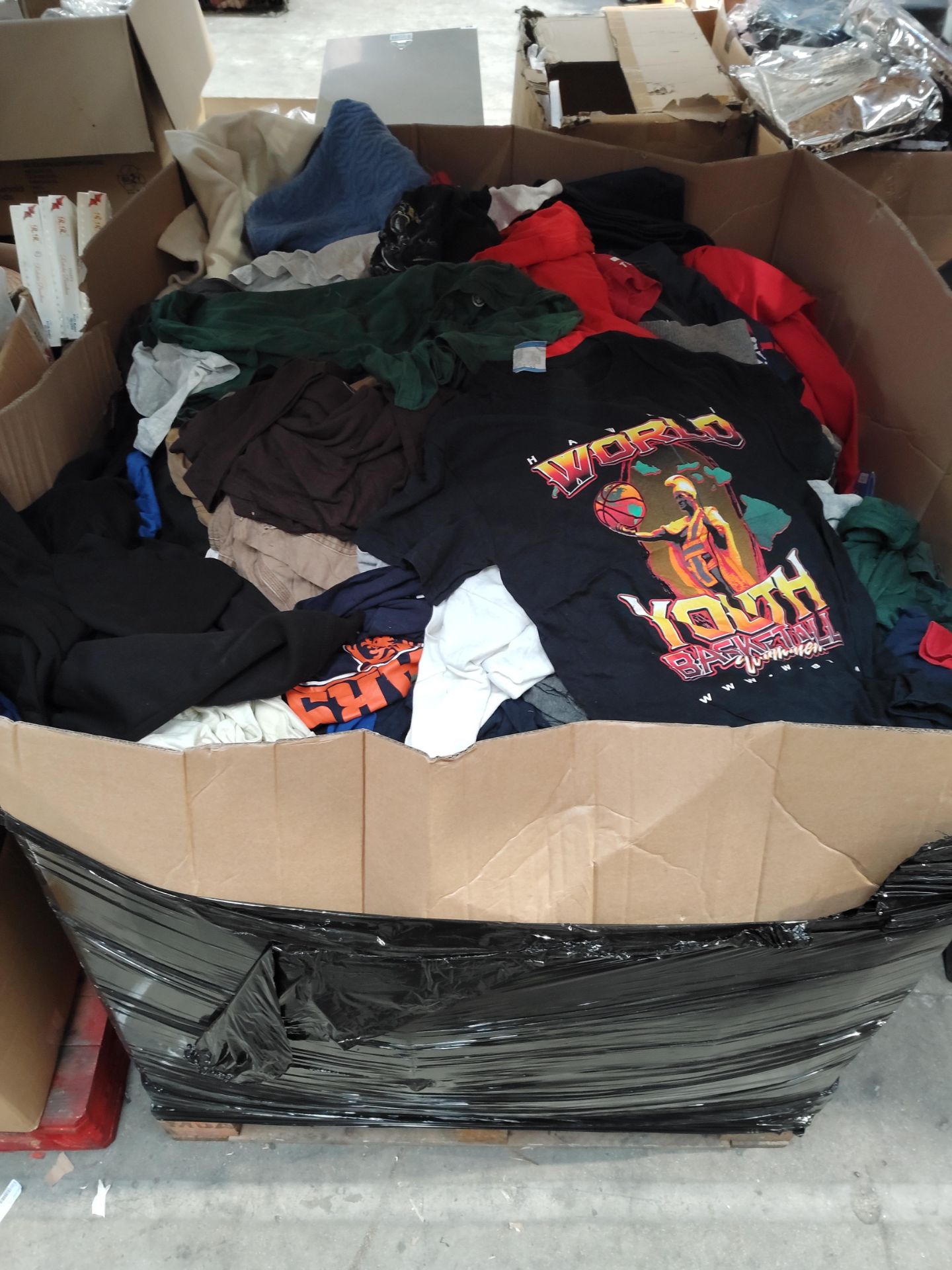 A large quantity of assorted pre-owned clothing and related.