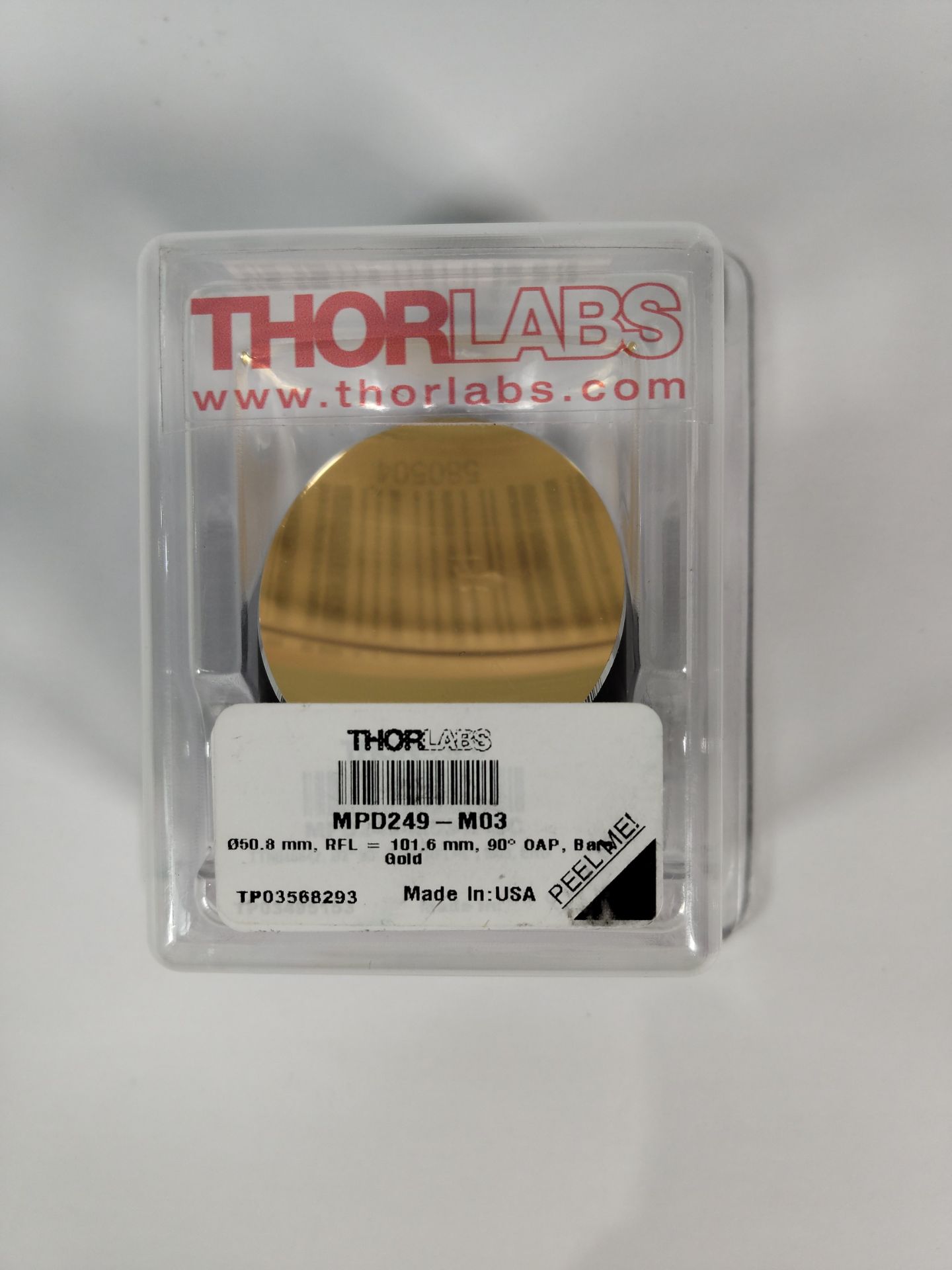 A Thorlabs MPD249-M03 - Ø2" 90° Off-Axis Parabolic Mirror, gold.