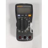 A pre-owned Fluke 117 handheld digital multimeter 600V AC/DC, 10A AC/DC.