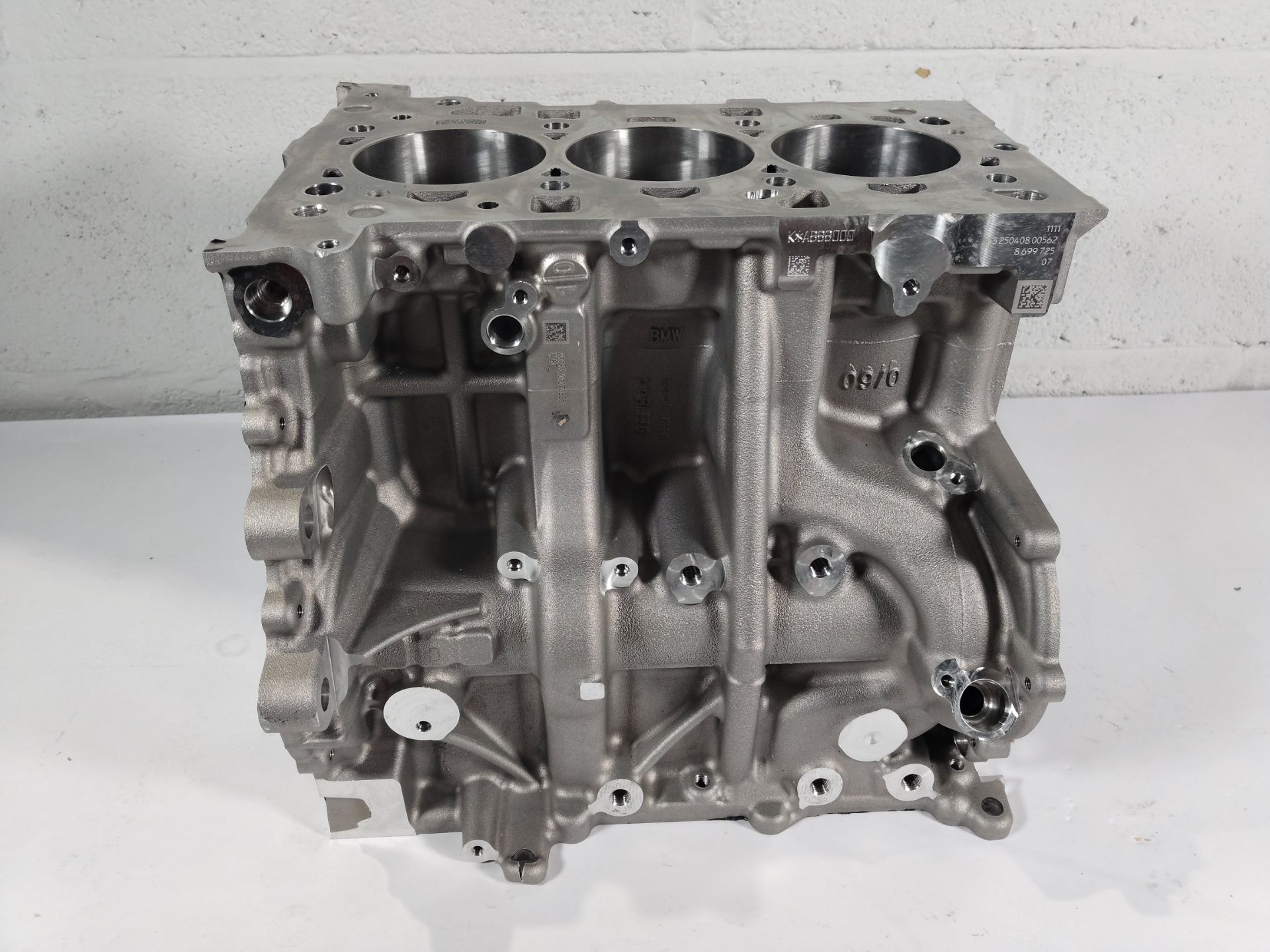 A BMW engine block (looks to be unused but the item may have a casting fault) (REF: B38A15M2).