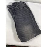 A pair of Victoria Beckham jeans (Size 28).