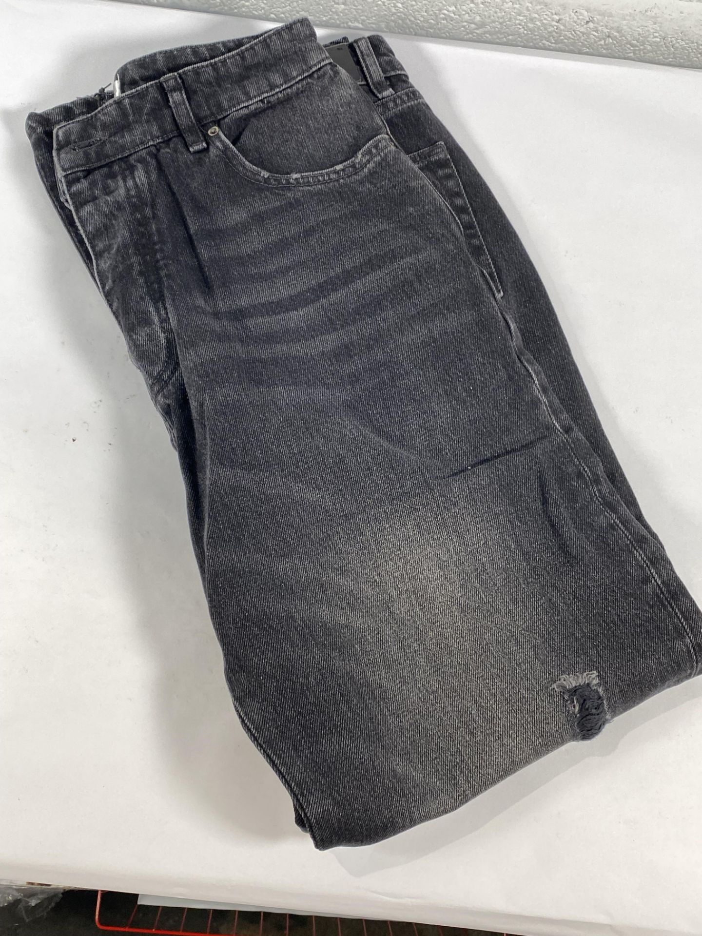 A pair of Victoria Beckham jeans (Size 28).