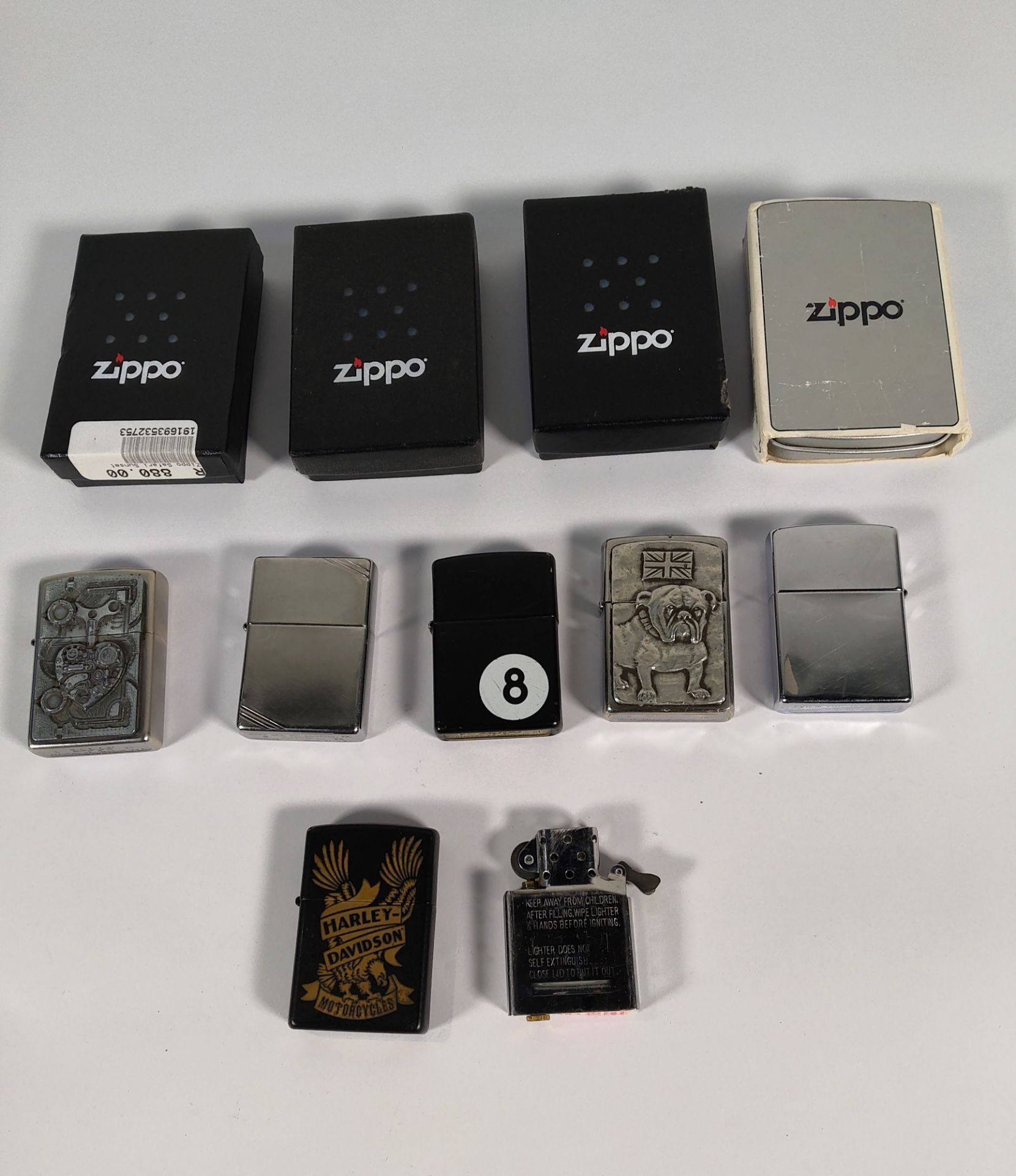 Ten assorted pre-owned Zippo wind proof lighters (over 18s only).