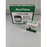An as new Rain Bird ESP-TM2 controller and a Rain Bird LNK2 WIFI module.