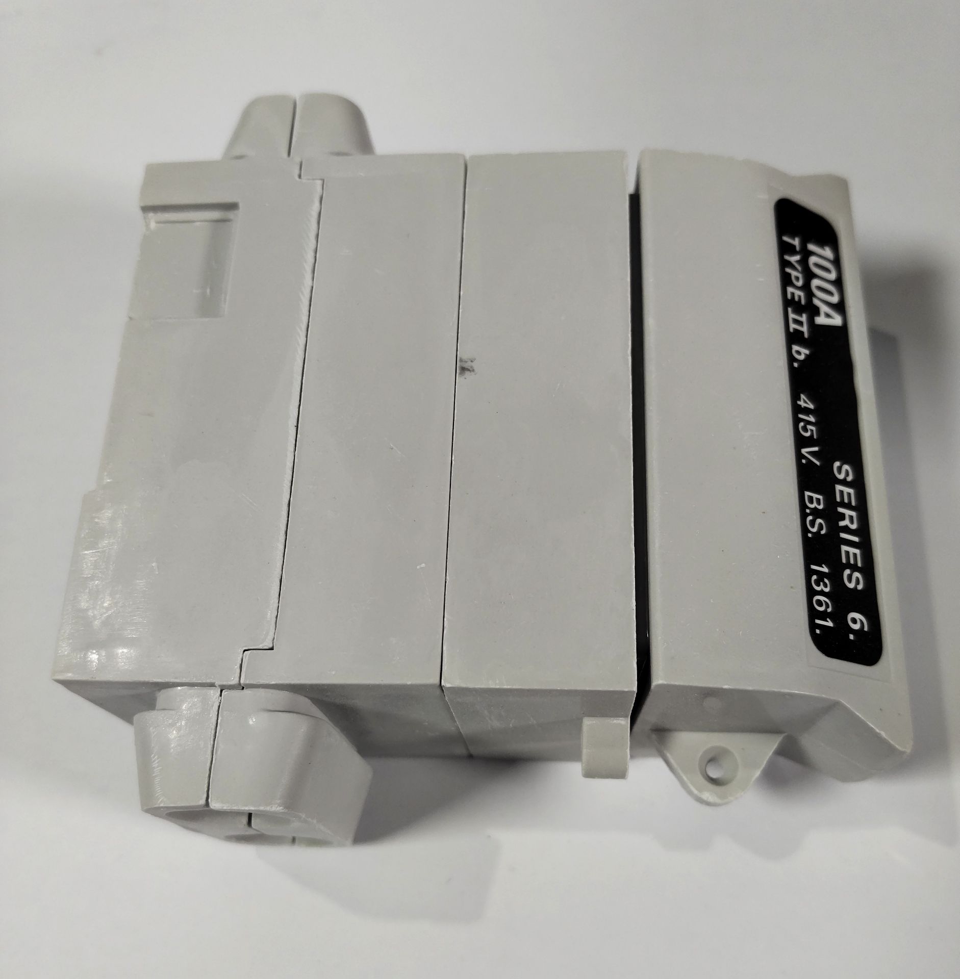 Ten Henley 100A insulated house service cut outs, series 6, single pole (54142-07). - Image 2 of 3