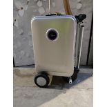 A pre-owned Air Express G45 wheeled ride on suitcase with battery.