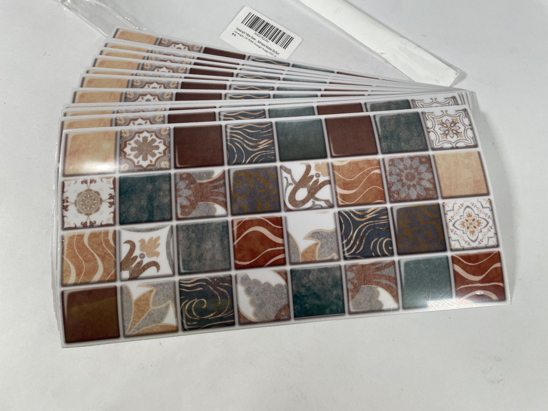Twenty five packs of twelve as new Fantasnight bathroom/kitchen tile design stickers, 30 x 15cm.