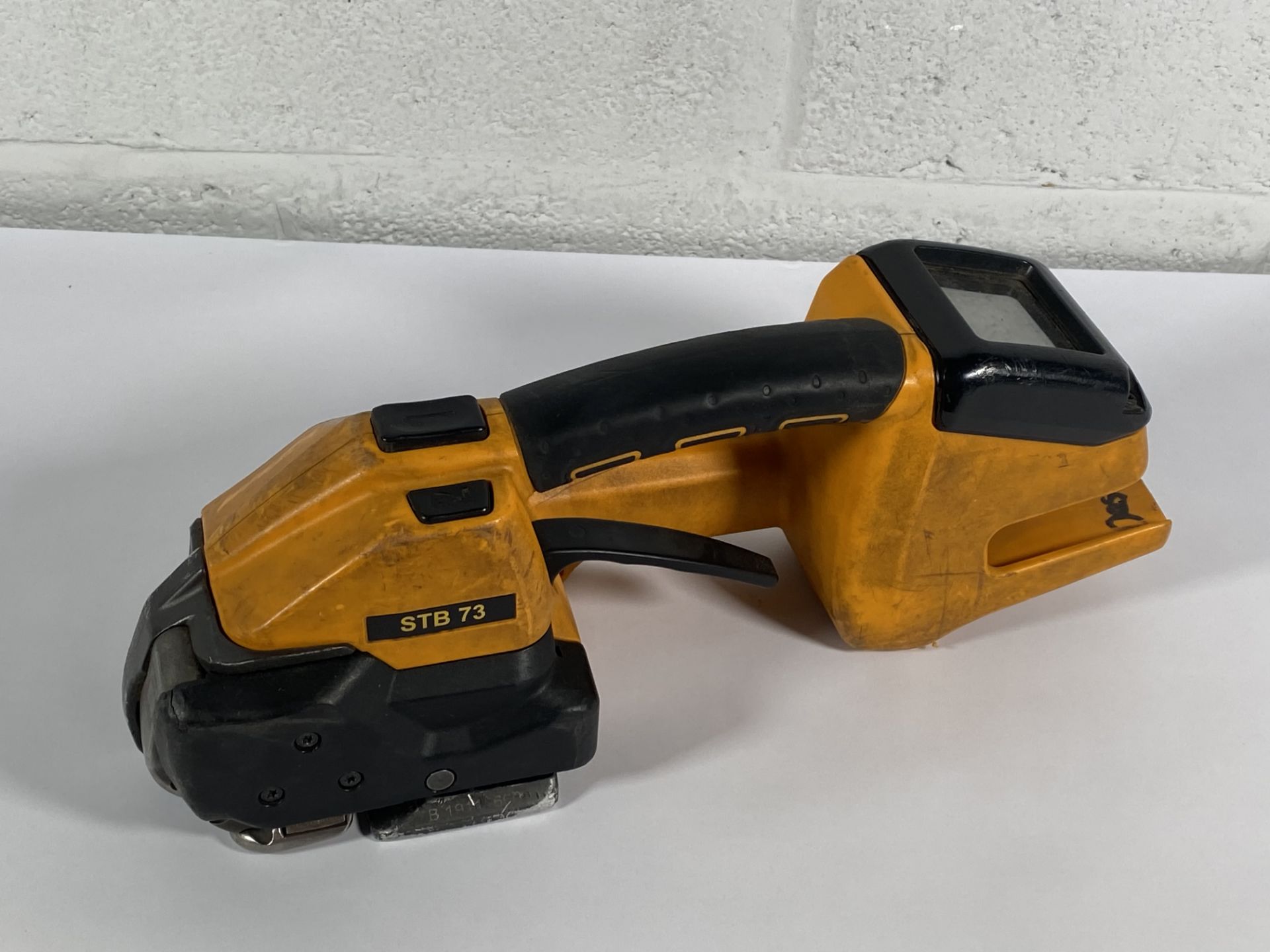A pre-owned Strapex STB 73 strapping machine.