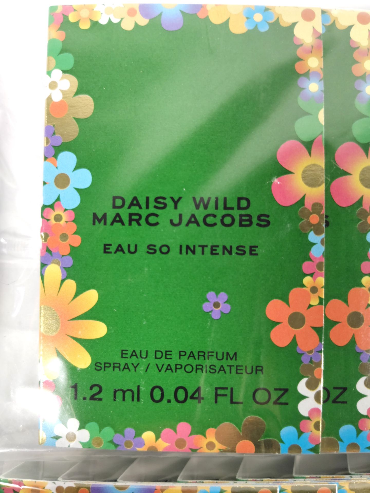 Five packs of Marc Jacobs Daisy Wild So Intense 1.2ml EDP fragrance vials (12 per pack - 60 total). - Image 2 of 2