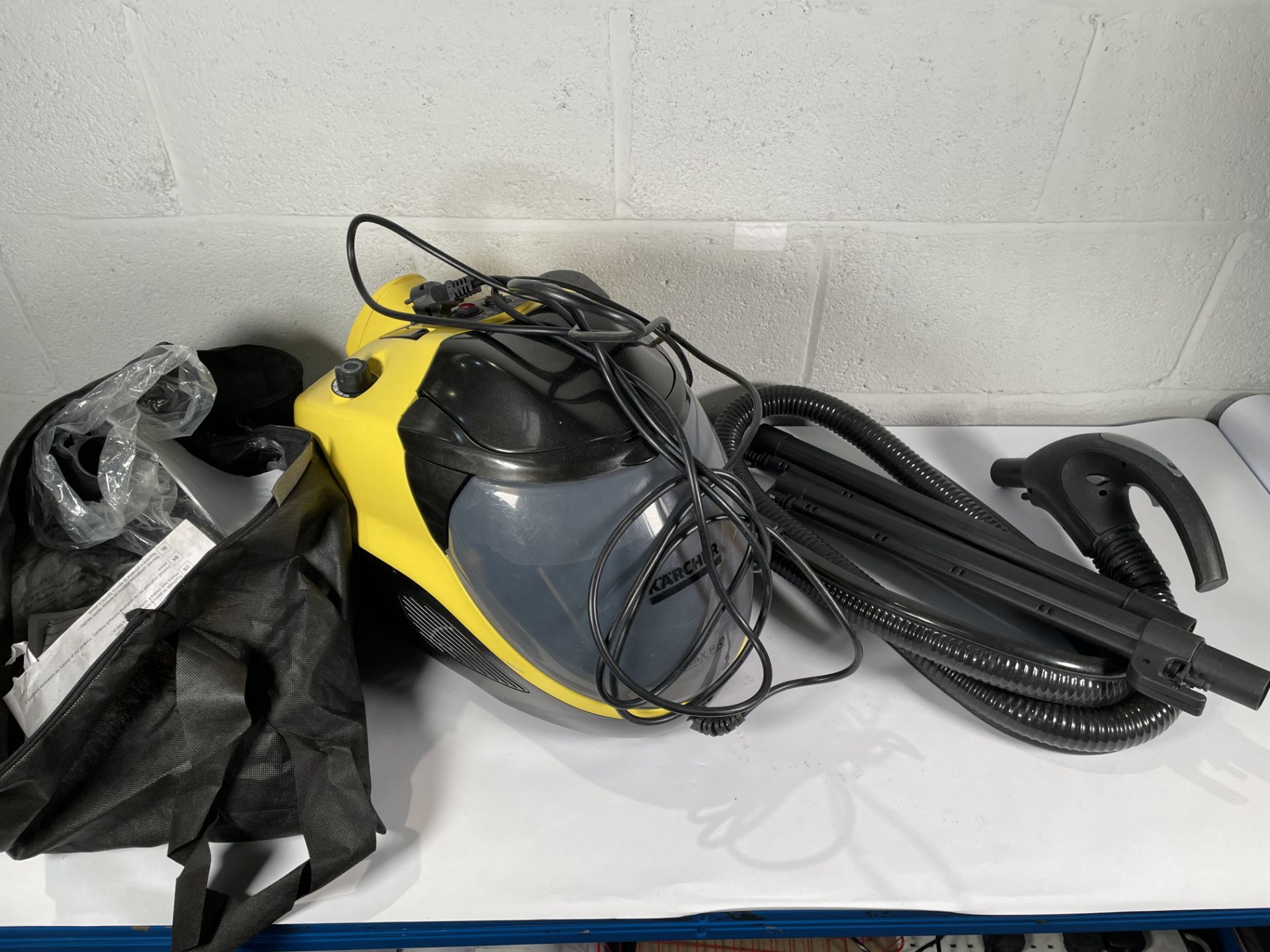 A pre-owned Kärcher Steam Vacuum Cleaner SV 7 (sold as seen, UK adaptor required).
