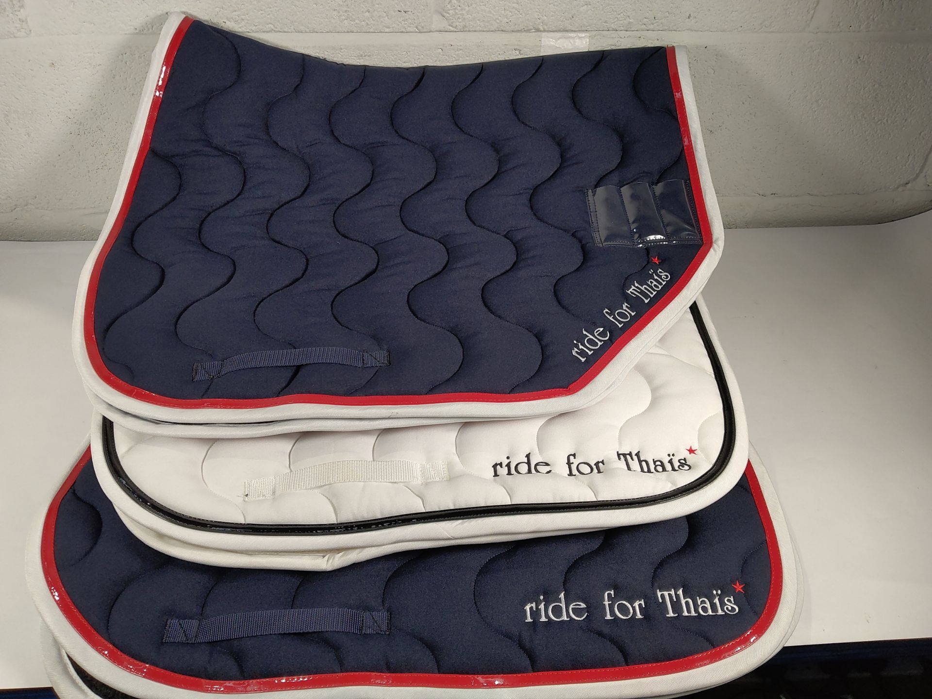 Three assorted pre-owned Paddock Sports 'Ride For Thais' Saddle Pads. - Image 5 of 5