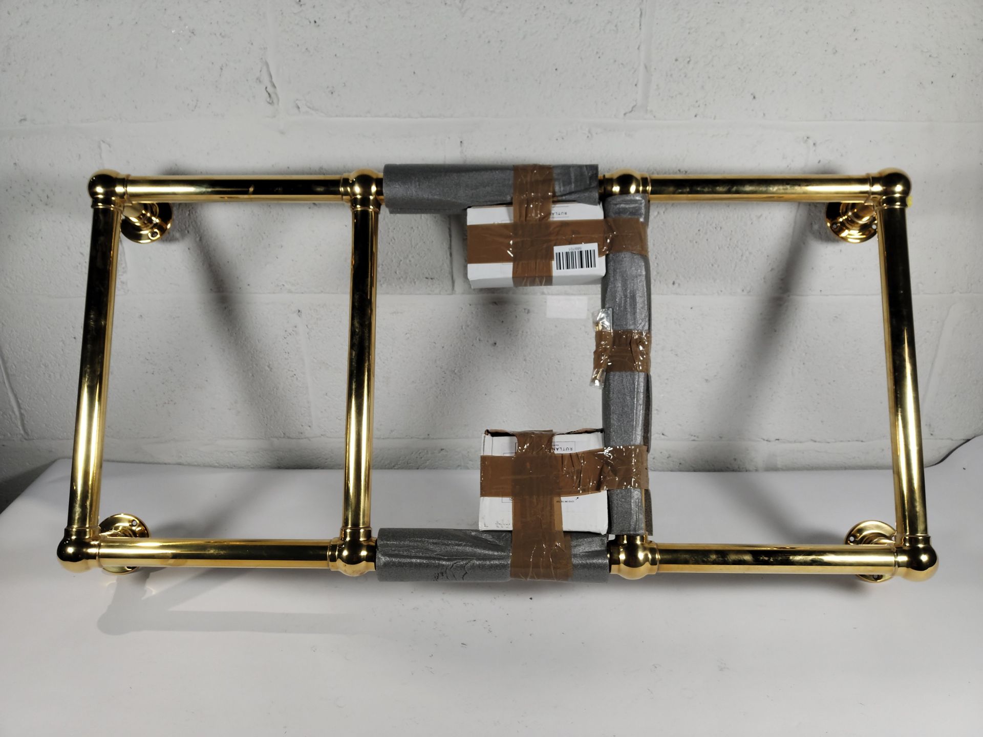 As new Rutland London Heated Towel Rail, Gold (some light transit marks).