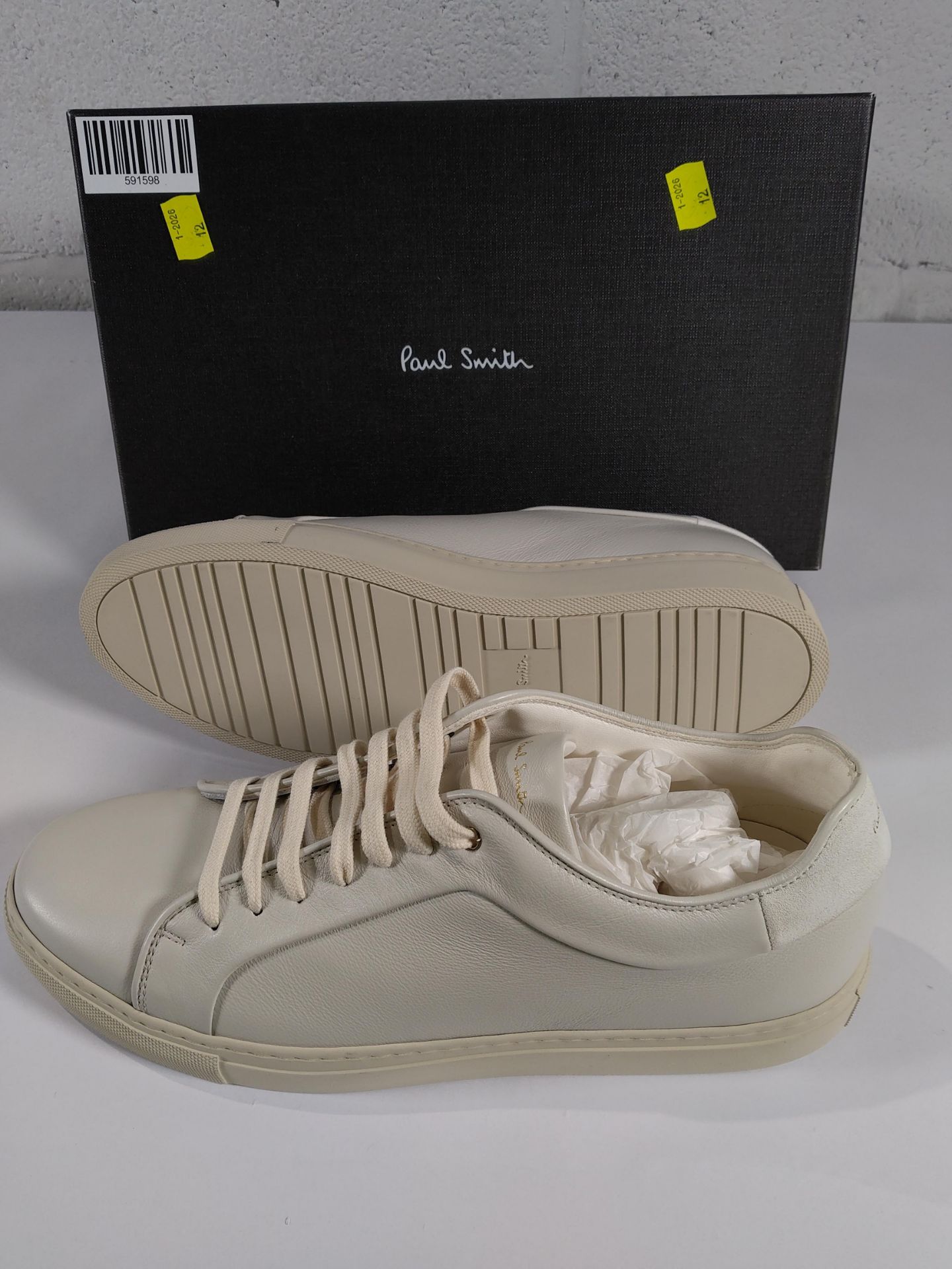 A pair of Paul Smith white leather cream basso trainers UK9.