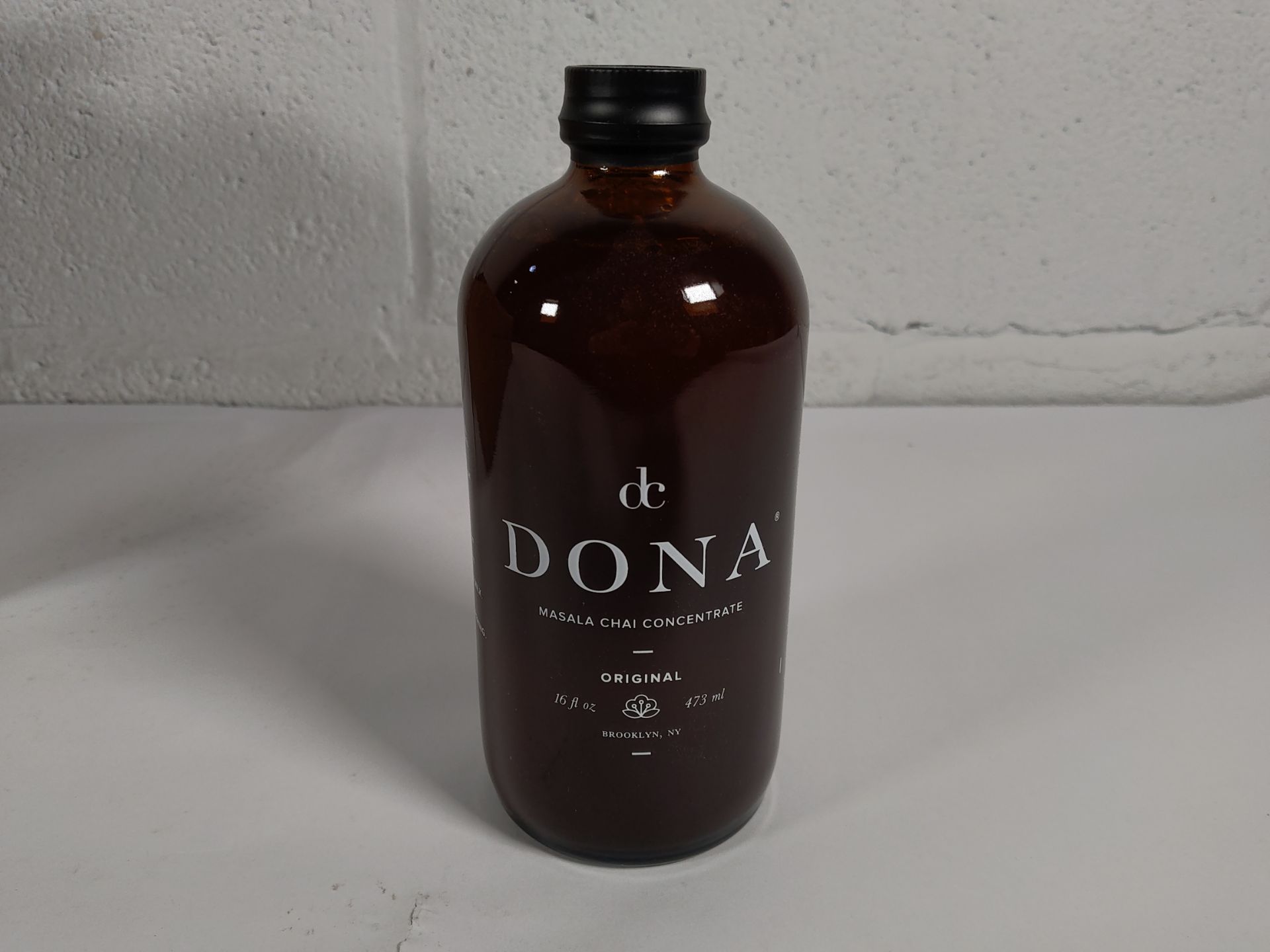 Twelve as new 16 fl oz bottles of dc Dona Masala Chai Concentrate Original flavour. BBE 05/05/26 (Gl - Image 2 of 4