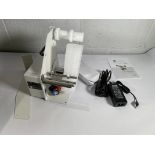 A Labelmate LD-100-RS with PSU, bracket and UK cord.