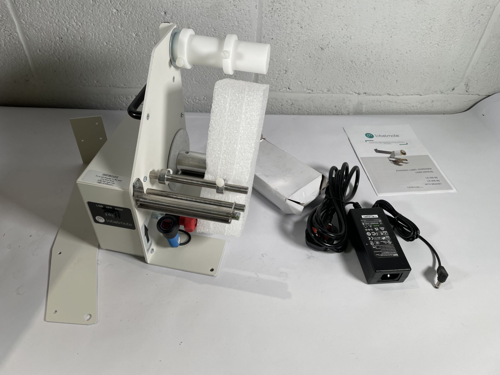 A Labelmate LD-100-RS with PSU, bracket and UK cord.