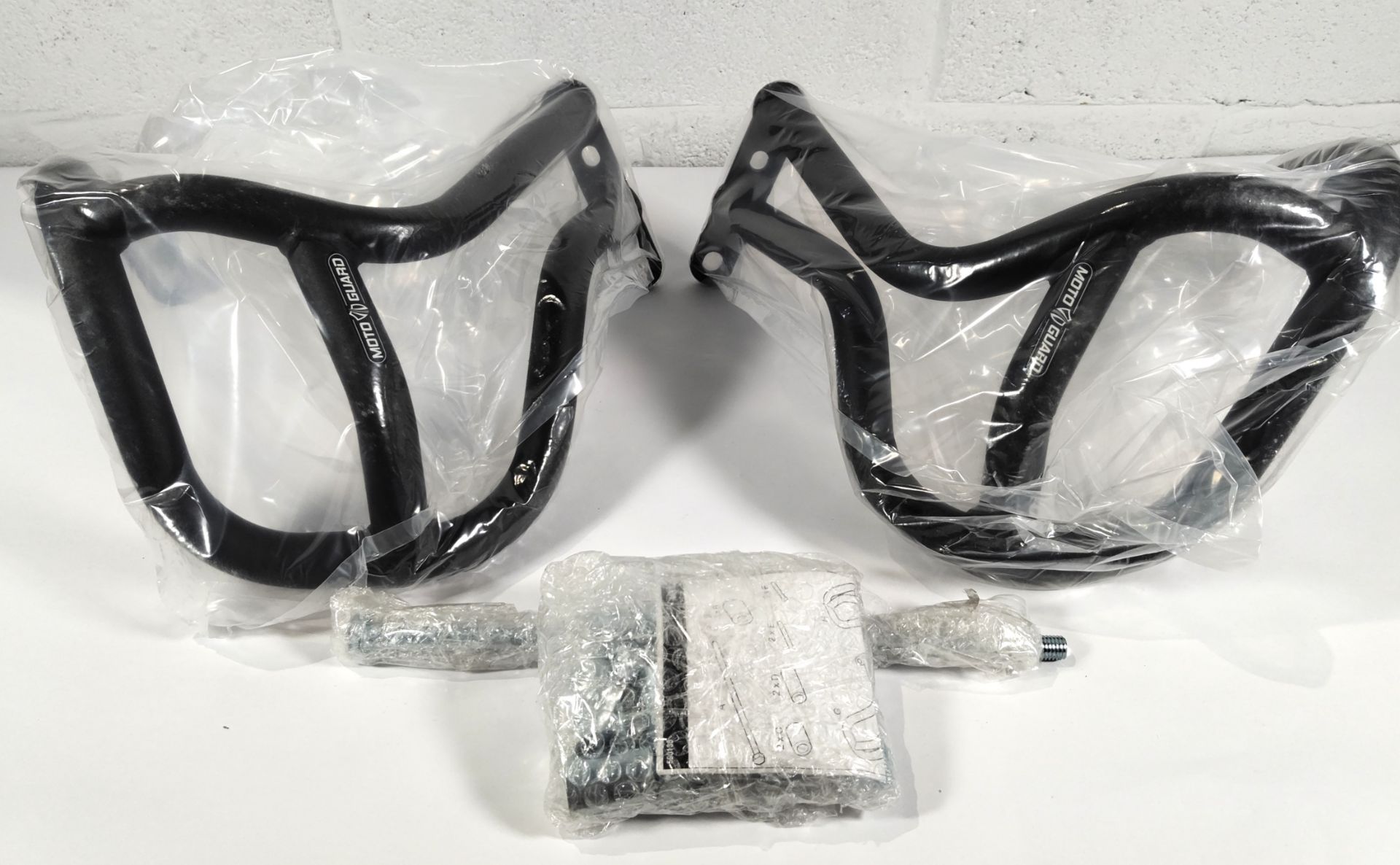 A Motoguard engine crash bar guards - possible fitment for BMW motorcycle. (part no. 560135)