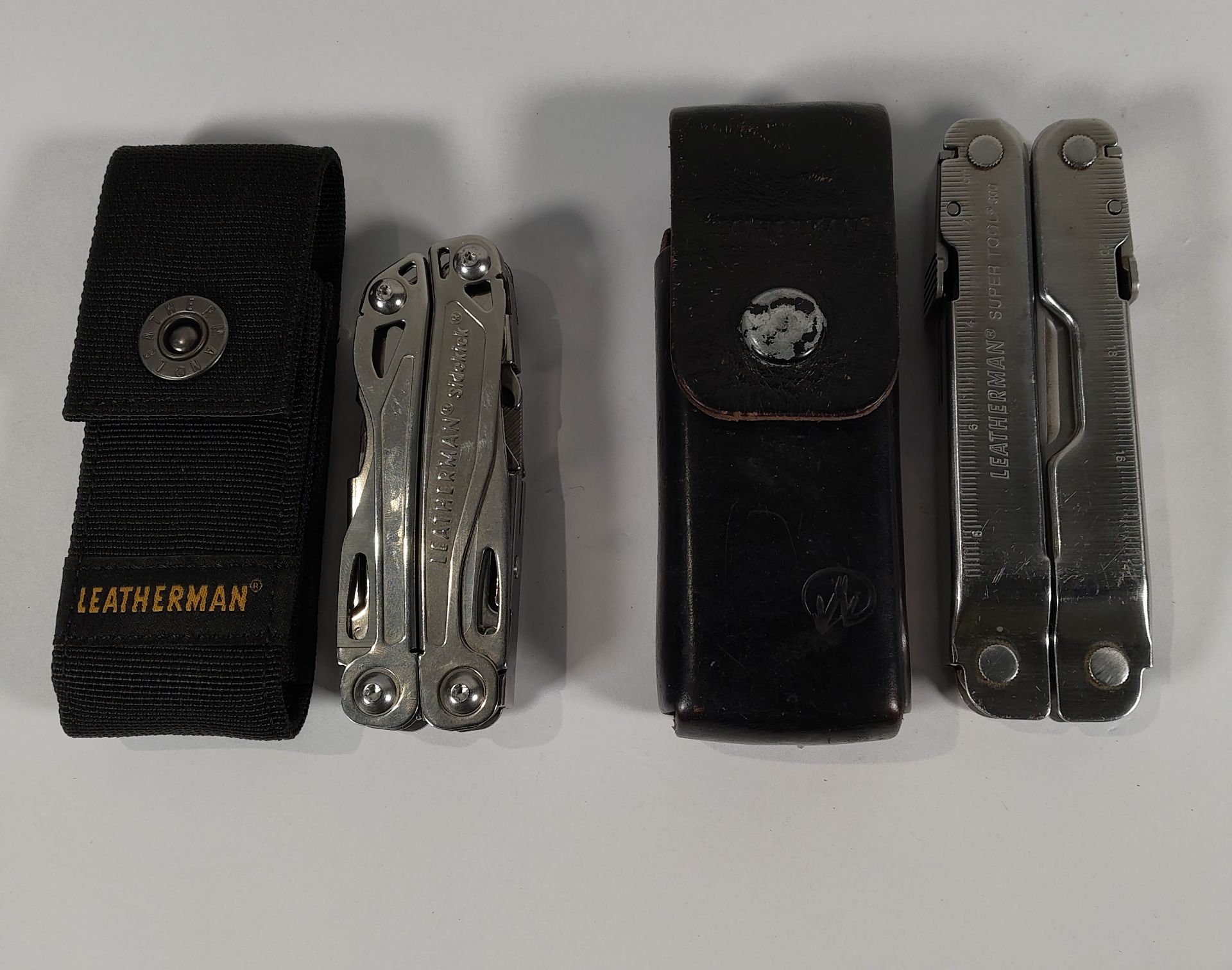 Two pre-owned Leatherman multitools to include Super Tool 300, Sidekick (over 18s only).