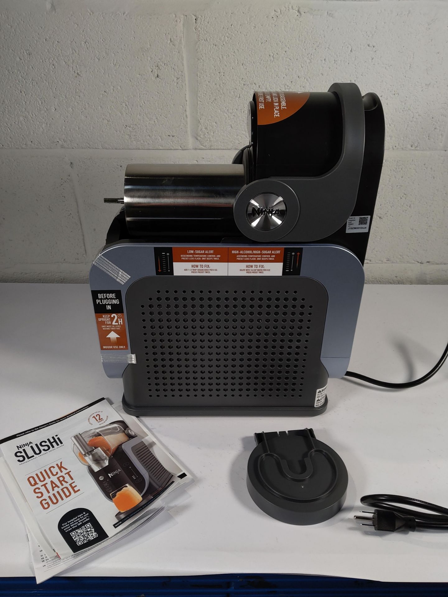 An unboxed Ninja Slushi professional frozen drinks maker (item incomplete and UK adapter required).