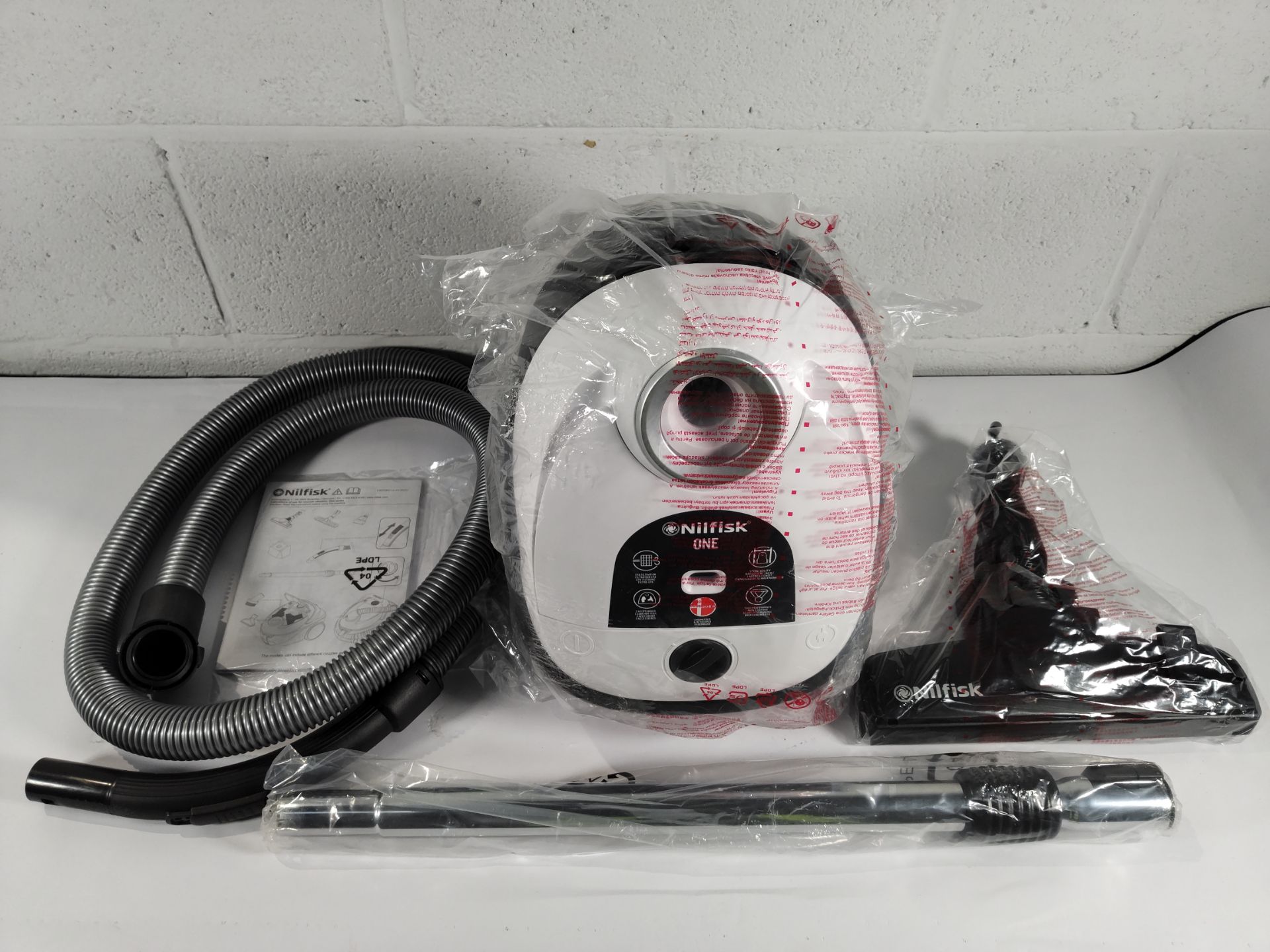 A Nilfisk One Series - The Small One vacuum cleaner in white, box opened (UK adaptor required) (WB10 - Image 2 of 2