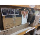 Assorted electrical and plumbing items on three shelves.