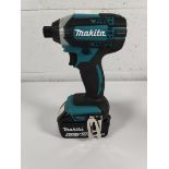 A pre-owned 2025 Makita DTD152 impact driver with battery.