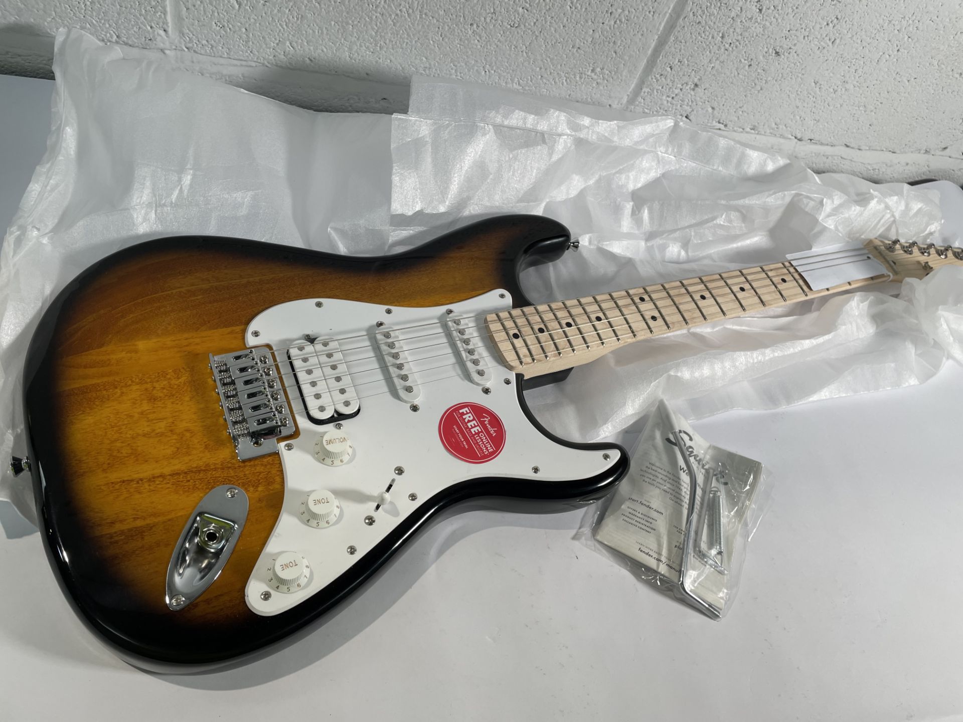 A Limited Edition Squier Sonic Stratocaster, HSS, 2-Colour Sunburst.