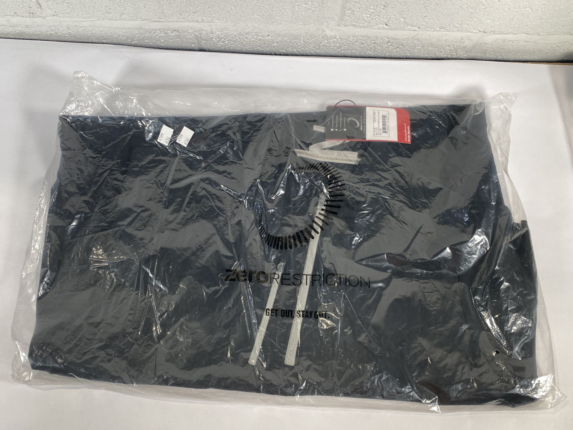 A Zero Restriction 1/4 zip-up waterproof jumper (XXL).