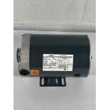 A Century AC motor (serial number 11024J2).