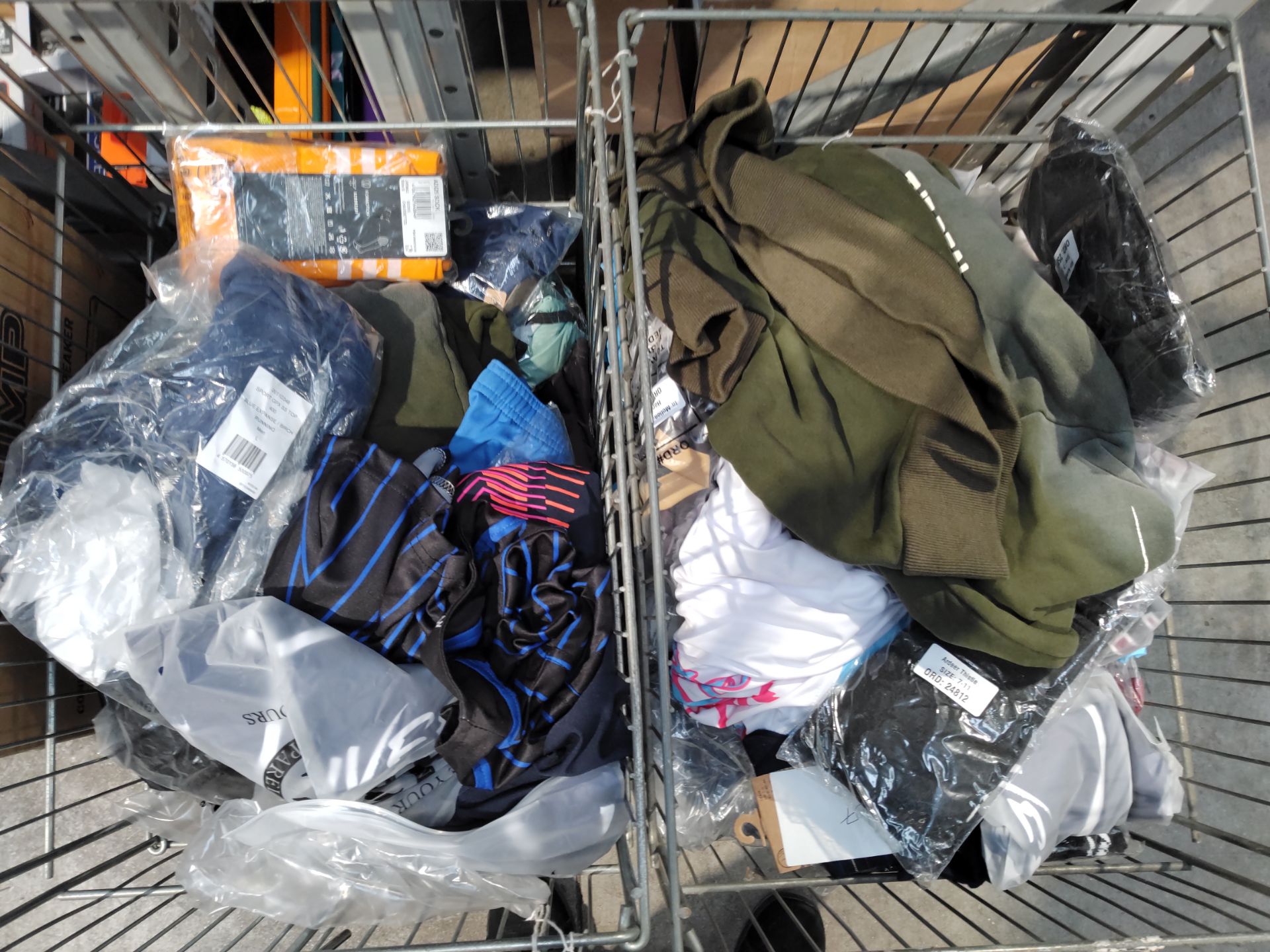 A large quantity of pre-owned and as new sportswear (cages not included). - Image 2 of 2
