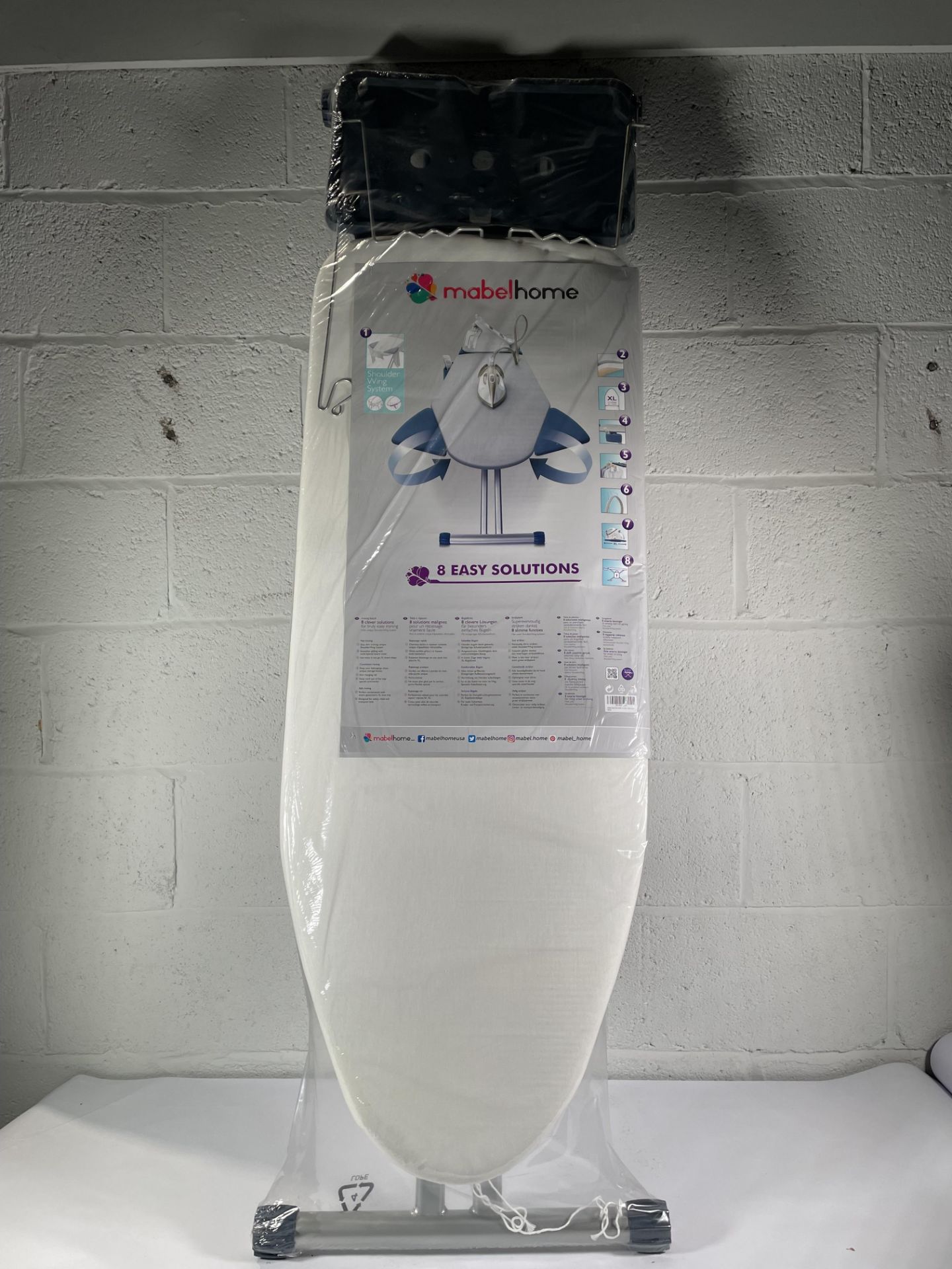 An as new Mabel Home extra-wide ironing, pro board with shoulder wing folding, 8 features.