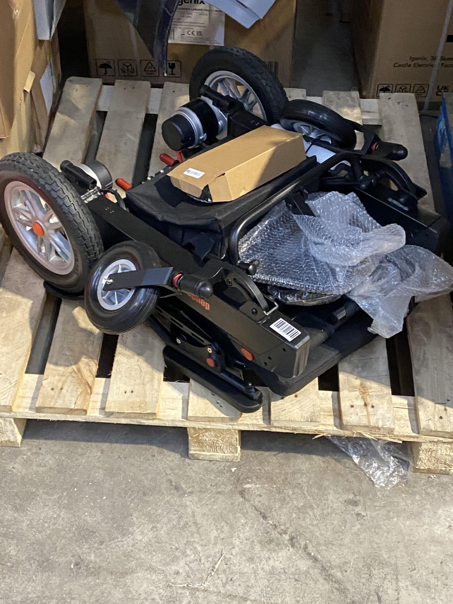 An as new Doudoux brushless electric folding wheelchair.
