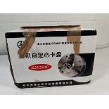 An unbranded three-jaw self-centering chuck lathe chuck (REF: K21250C / M10).