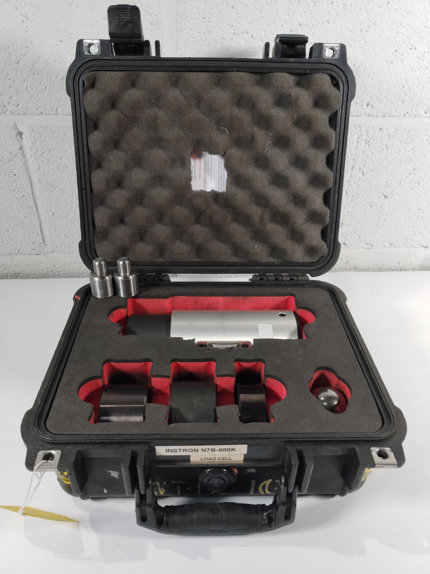 A pre-owned Instron load cell (REF: N7B-600K, Sold as Seen).