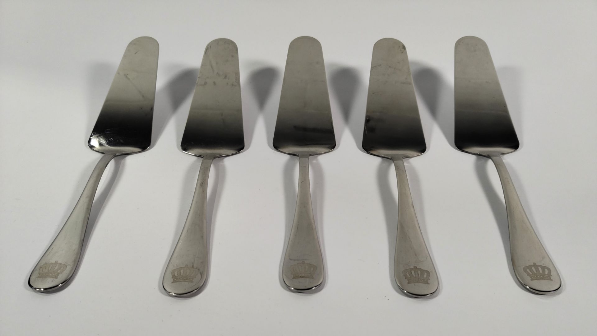 Five Mepra 18/10 Italy cake servers.