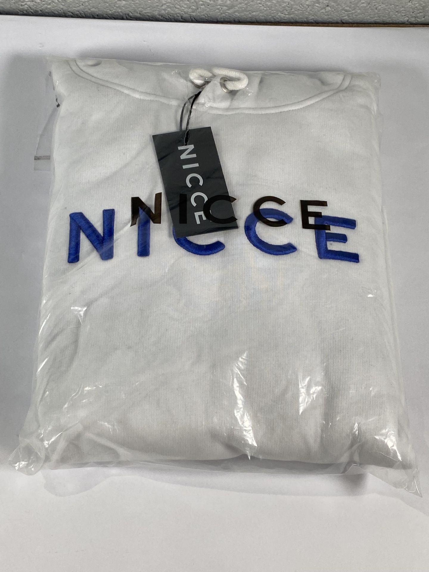 Three Nicce Rhodium hoodies (2x Medium and 1x Large).