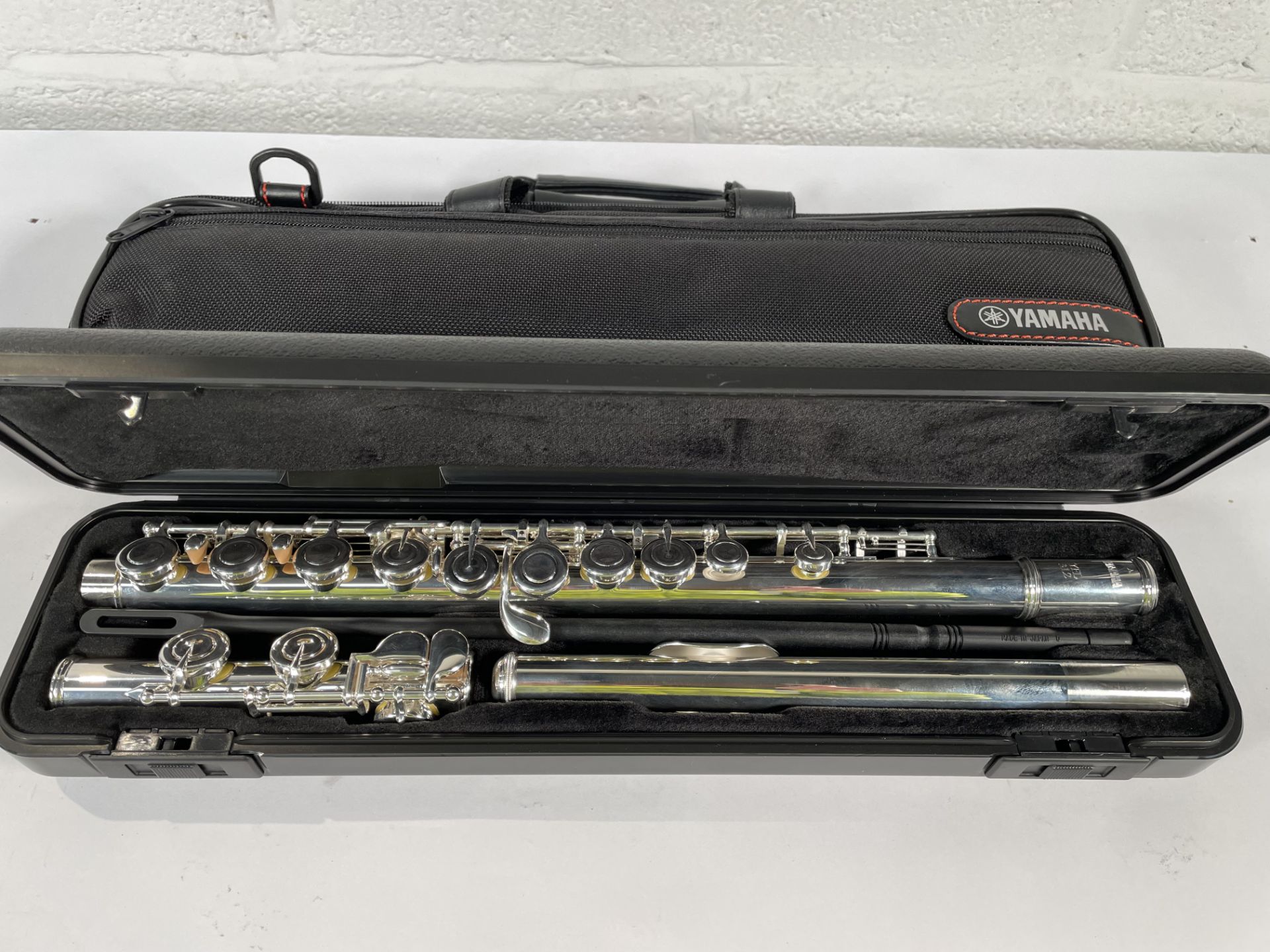 A pre-owned Yamaha YFL-312 Flute.
