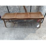 An as new Zara home wood and rattan bench 47 x140 x 39cm (brown).