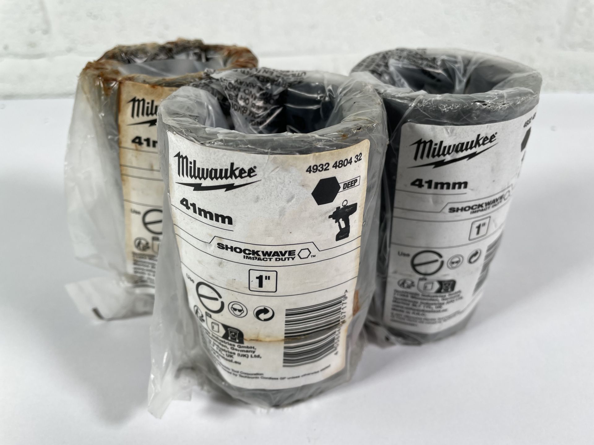 Three as new Milwaukee 1" drive, deep hex impact sockets, 41mm, metric, black oxide finish.