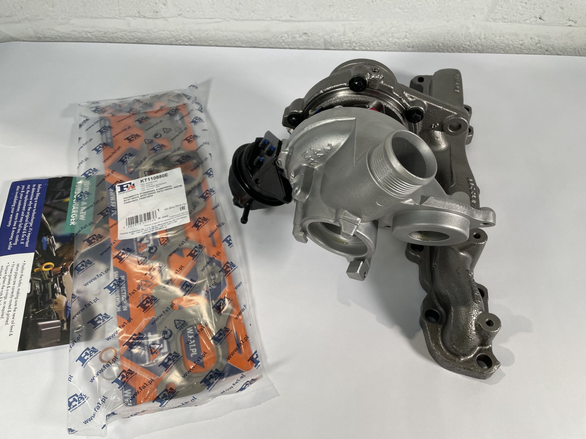 A Carwood Garrett 813860 Turbocharger with some minor damage (sold as seen).