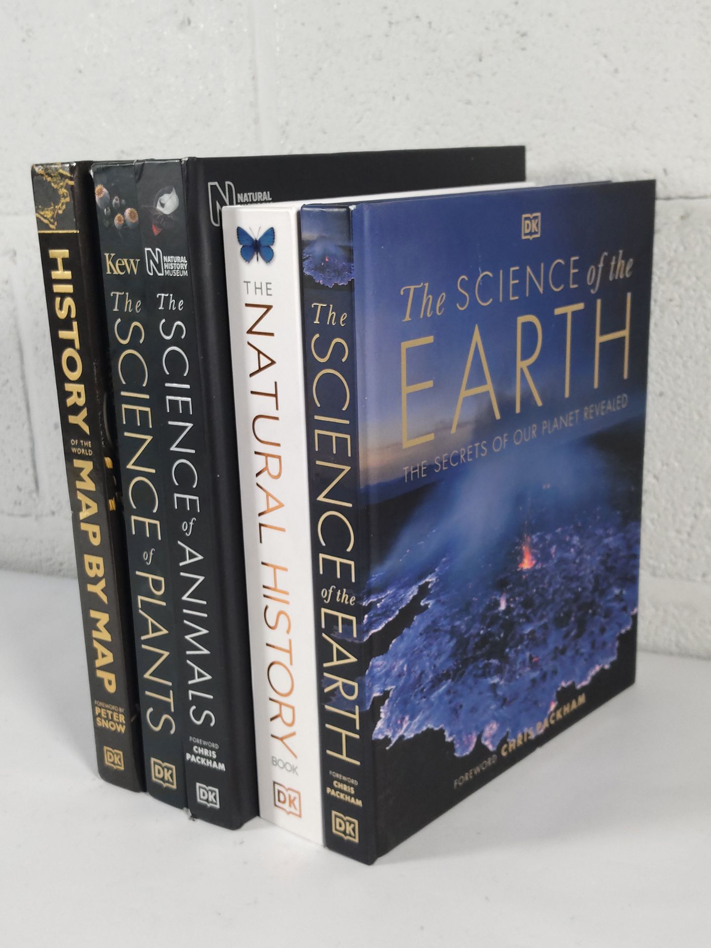 Five DK hardcover books to include The Science of the Earth, The Natural History Book, The Science o