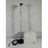 A pre-owned Occhio Sento Tavolo in Matt Black with stand.