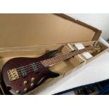 An Ibanez SR300EDX bass, Wine Red Frozen Matte.